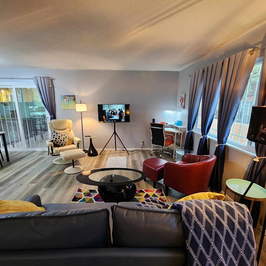 Living room with dedicated work area and Amazon Fire TV.