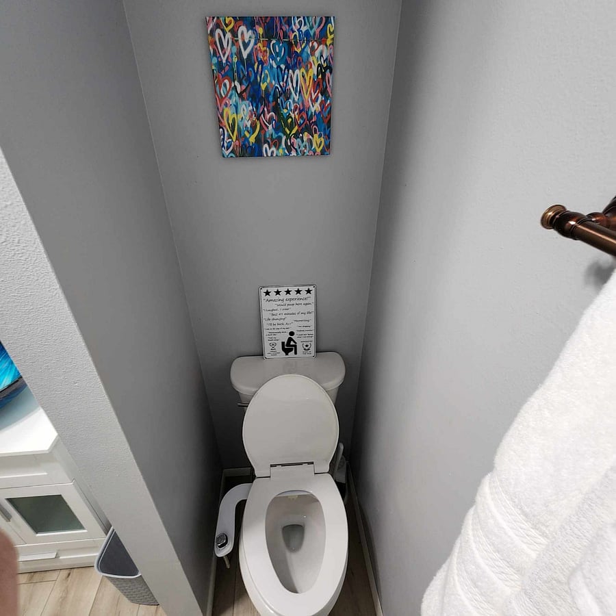 Toilet area with bidet.