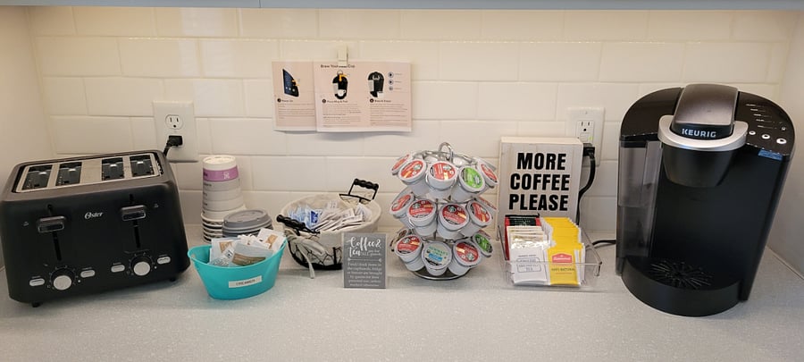 Coffee and tea are provided in the pantry/coffee bar area.