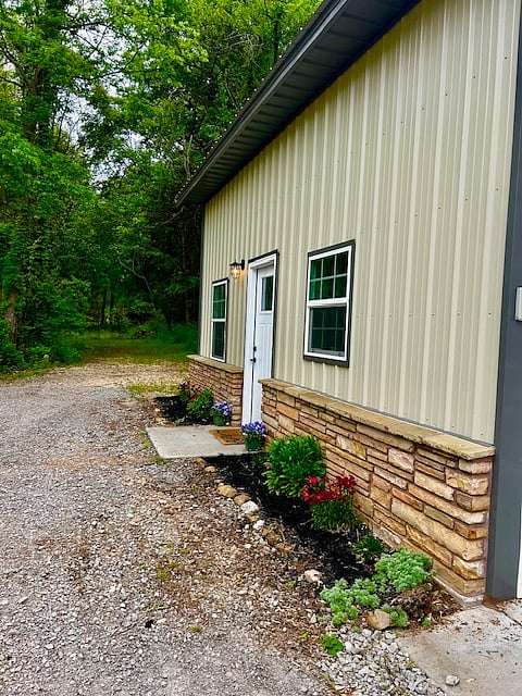 Beautifully landscaping with views all around of the forest.