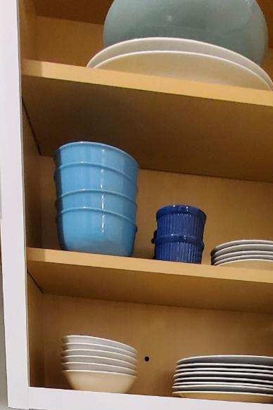 The full Kitchen is stocked with dishes, pots and pans!