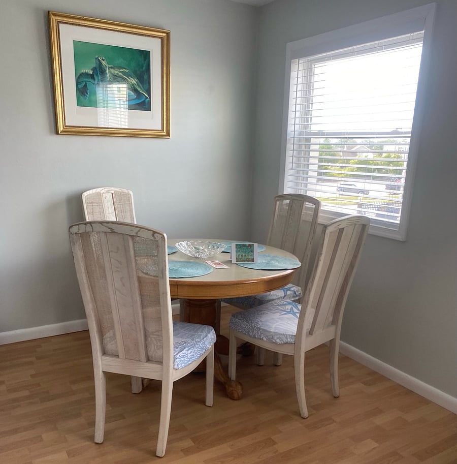 Dining area, with a matching 5th chair nearby for guests!