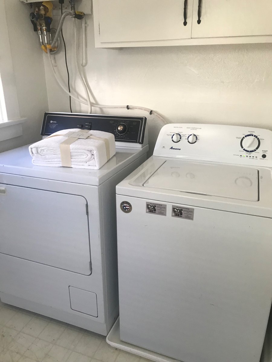 Dedicated wash room at the back door entry, new tankless water heater.