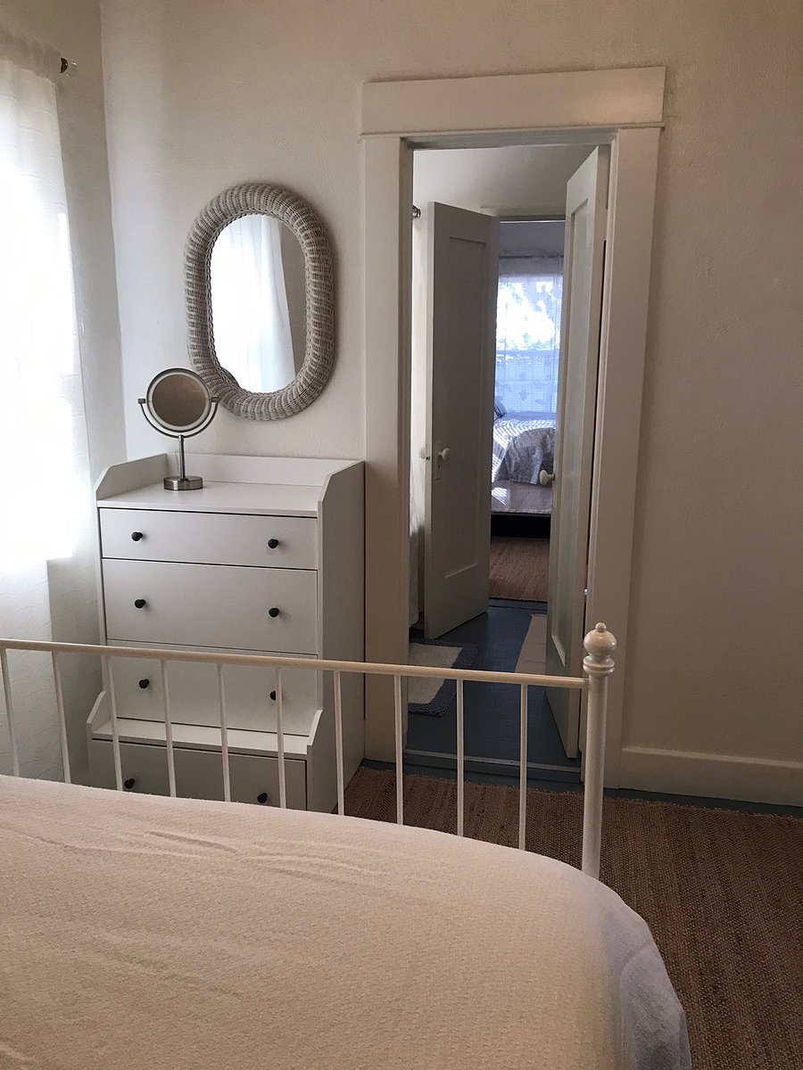 Both rooms have dressers and small closets.