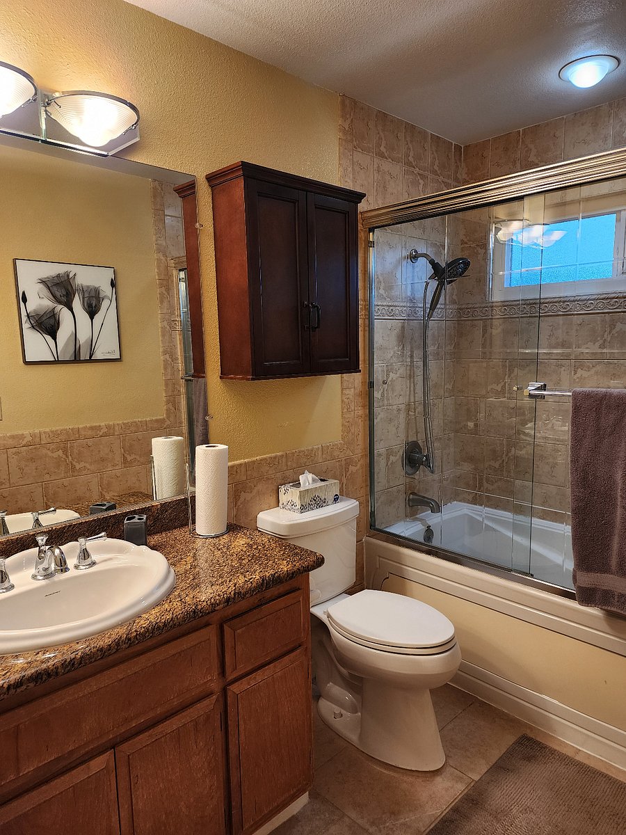 Private bathroom for bedroom #1 with shower and jetted tub.