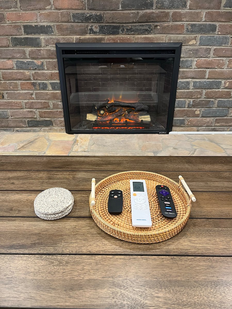 Electric fireplace also has adjustable heat and crackling sounds.