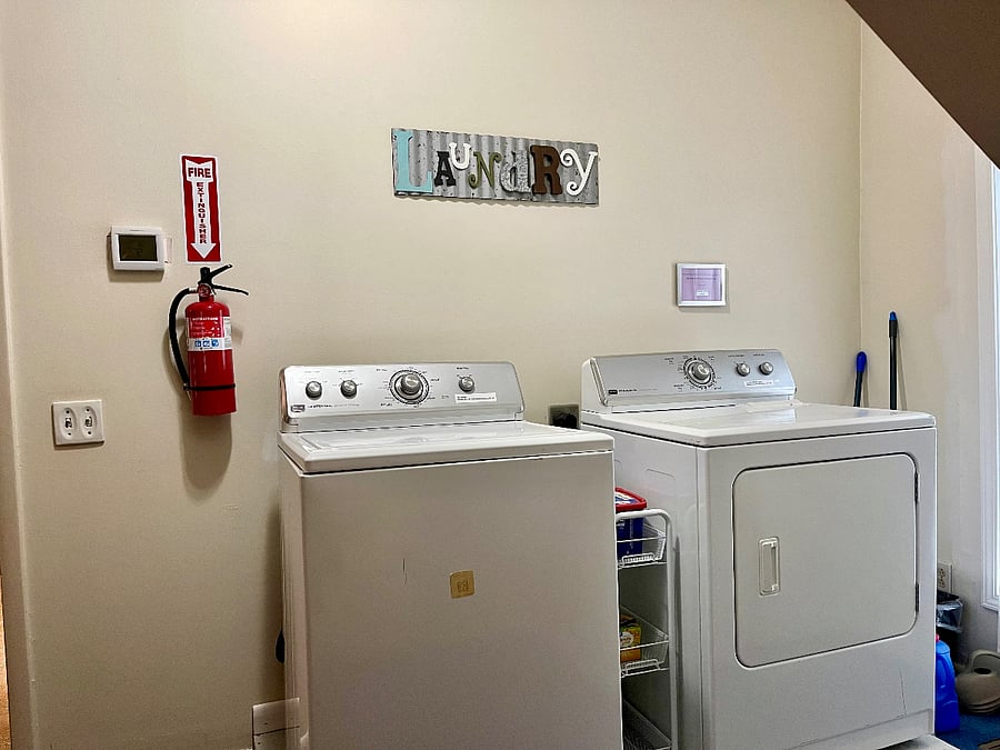 Laundry area with washer and drier is conveniently right by the bedrooms!