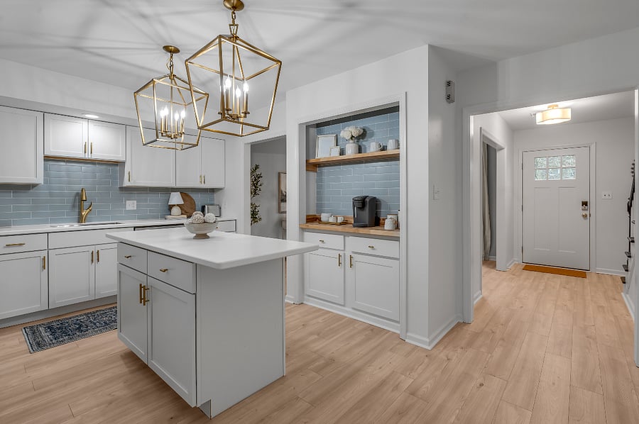 Completely renovated chef's kitchen with new appliances, coffee bar and front entryway view