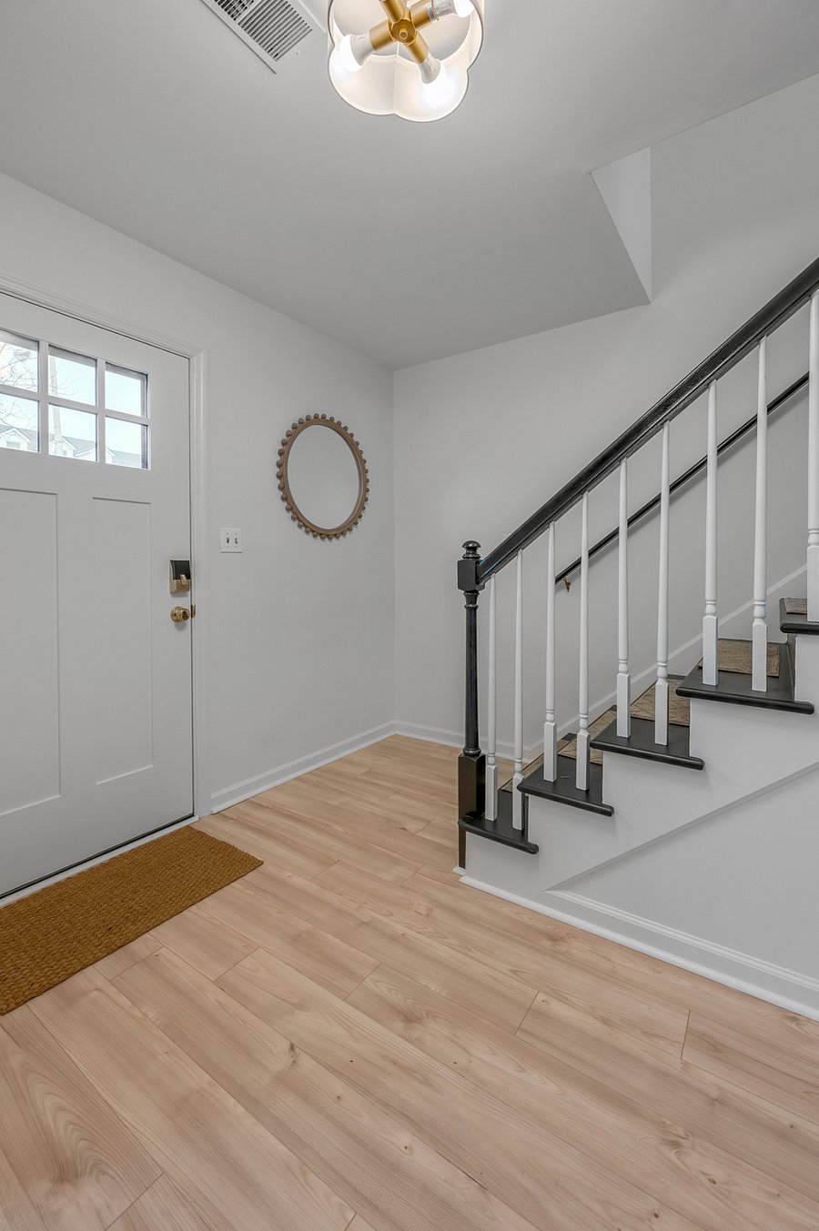 Front entryway with staircase to 2nd level
