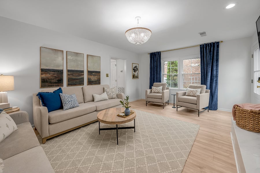 This first floor living room puts the "O" in cozy! :) To the right of the windows is the entryway from the fenced backyard in this pic.