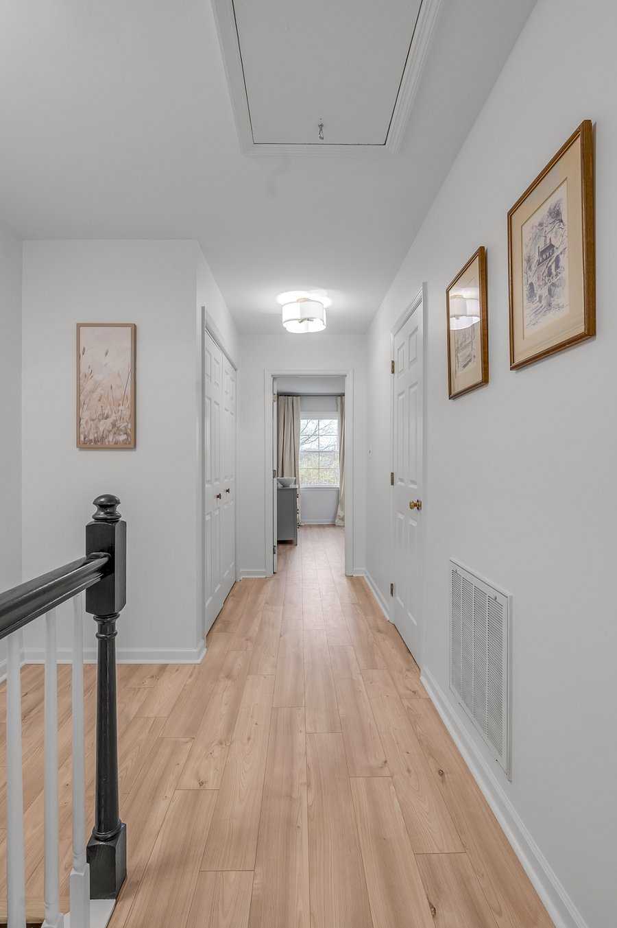 Once you are at the top of the stairs you can see closet on left with washer,/dryer and two additional master bedrooms with full bathrooms.