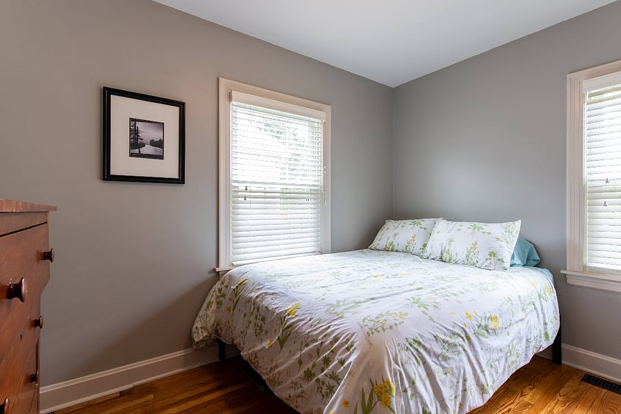 Bedroom 2 - Queen sized bed, dresser, work station, and small walk-in closet.