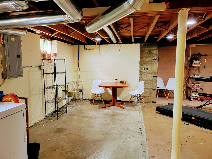 Basement provides ample open space for exercise and/or storage.