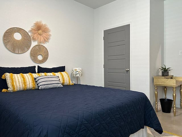 3rd bedroom queen bed and with nice size closet (door seen here).
