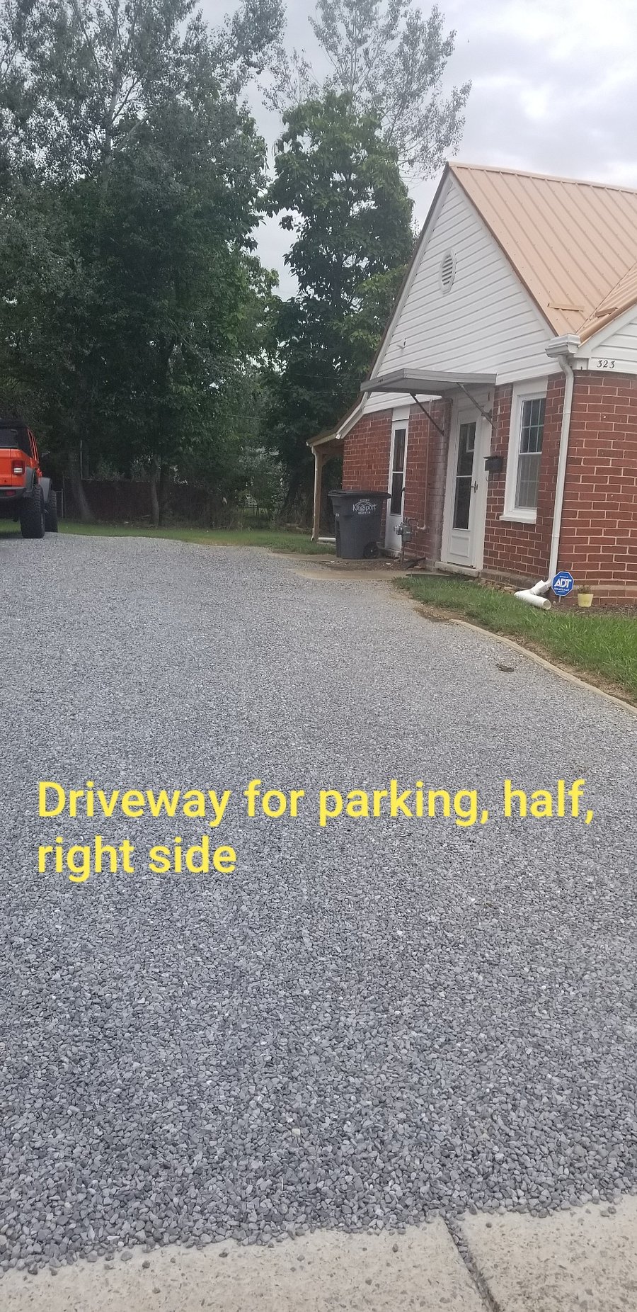 Private off street parking; parking is on the right side (neighbor parks on the left side of driveway)