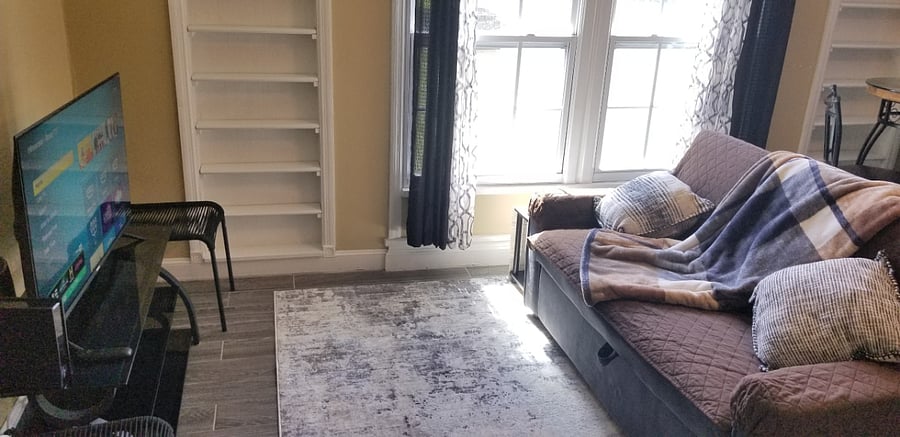 Couch/rug, front windows