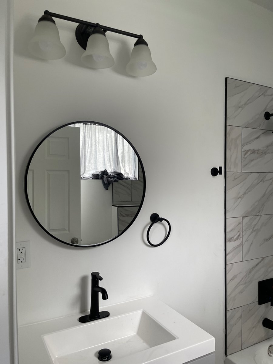 Master rear bathroom attached to bedroom.