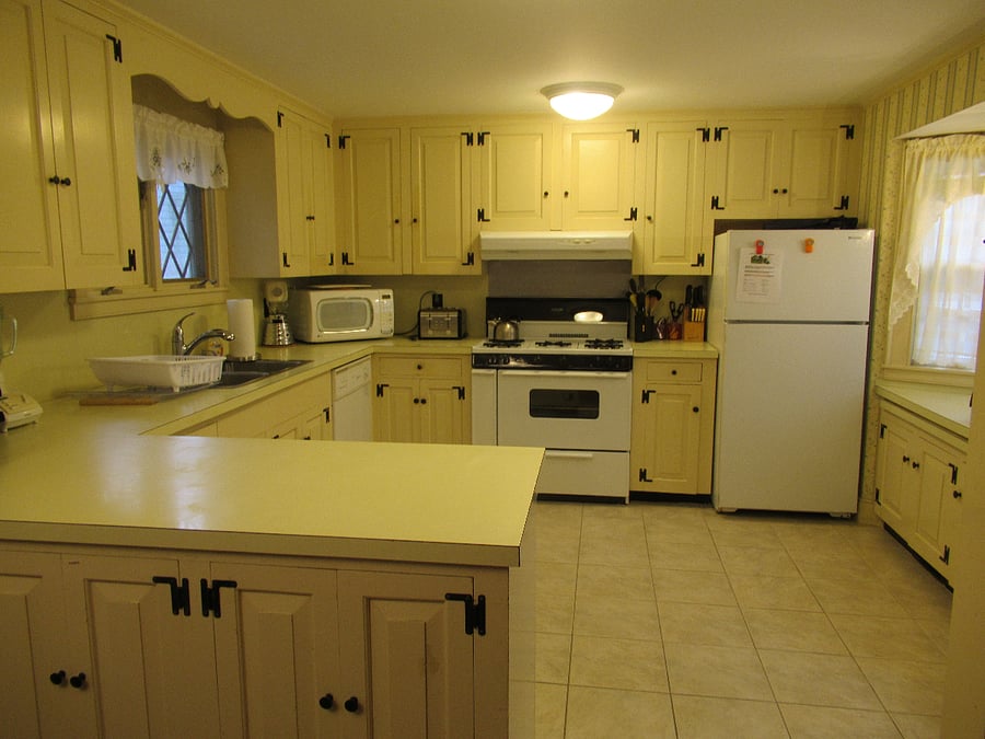Full kitchen, completely outfitted with appliances, drip coffee maker, dishwasher, pots, pans, utensils, dish ware, microwave, bagel toaster, toaster oven and more!