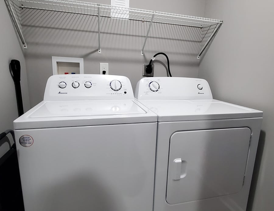 In unit Laundry Room with full size washer and dryer