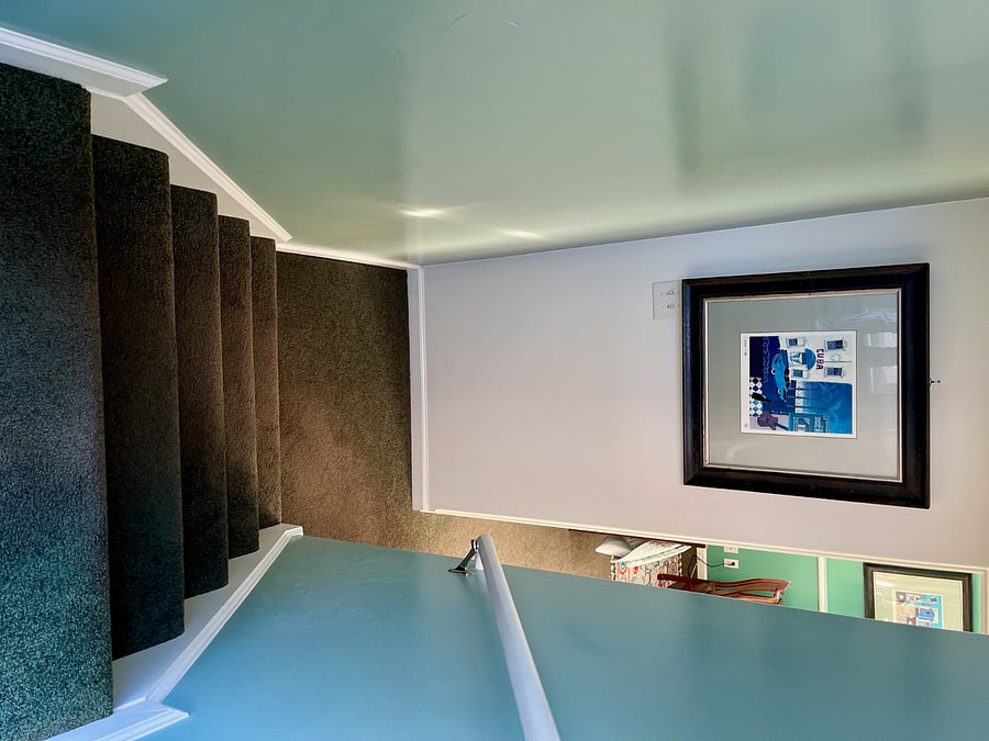 Stairway leading down to all 3 bedrooms and laundry