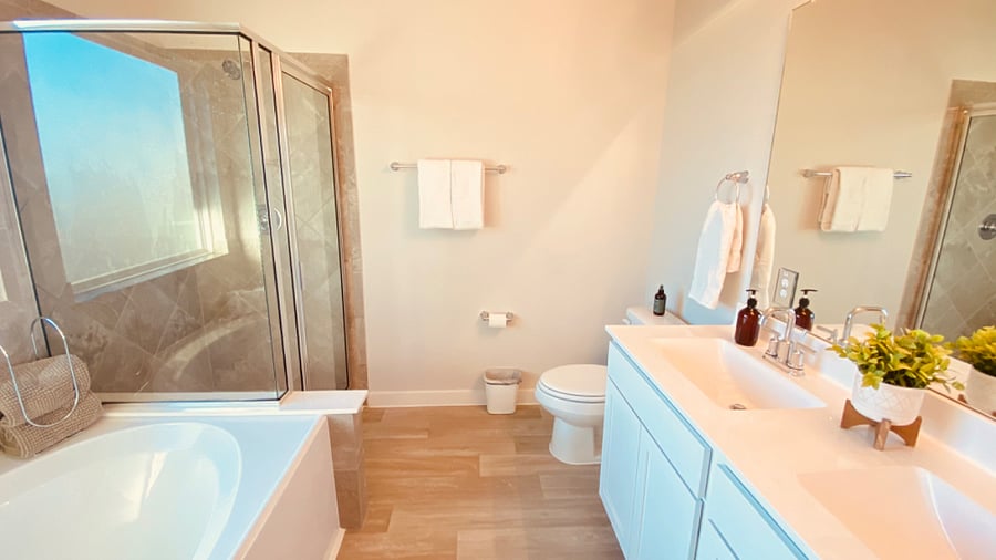 Appreciate the accessibility of the primary bathroom with walk-in shower and relaxing garden tub.