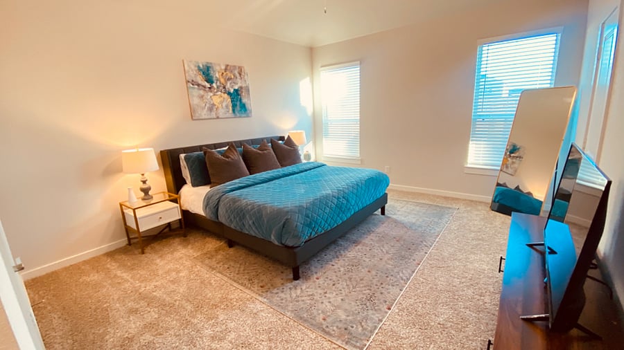 Enjoy the king bedroom with plenty of space to lounge and relax.