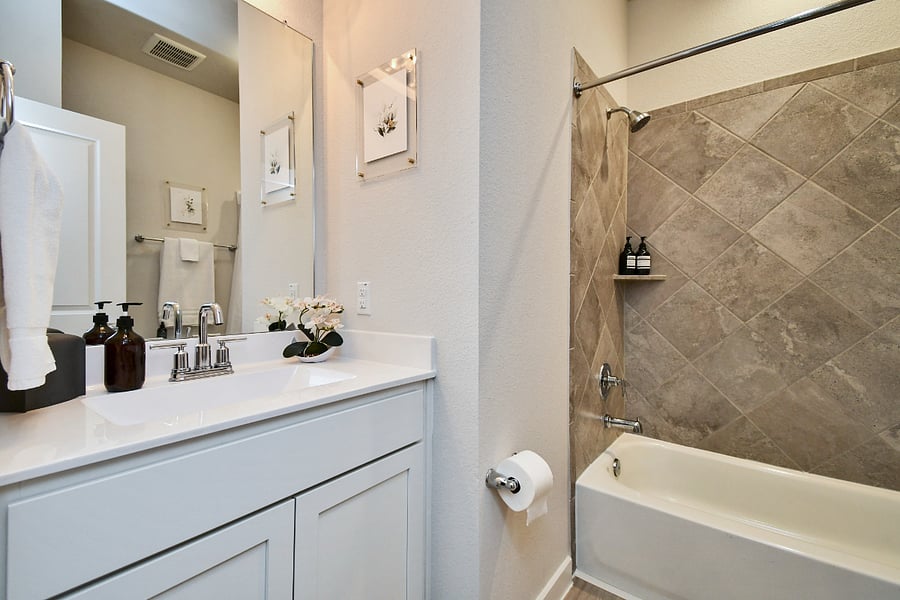 Relish in the guest bathroom with shower and tub combo.