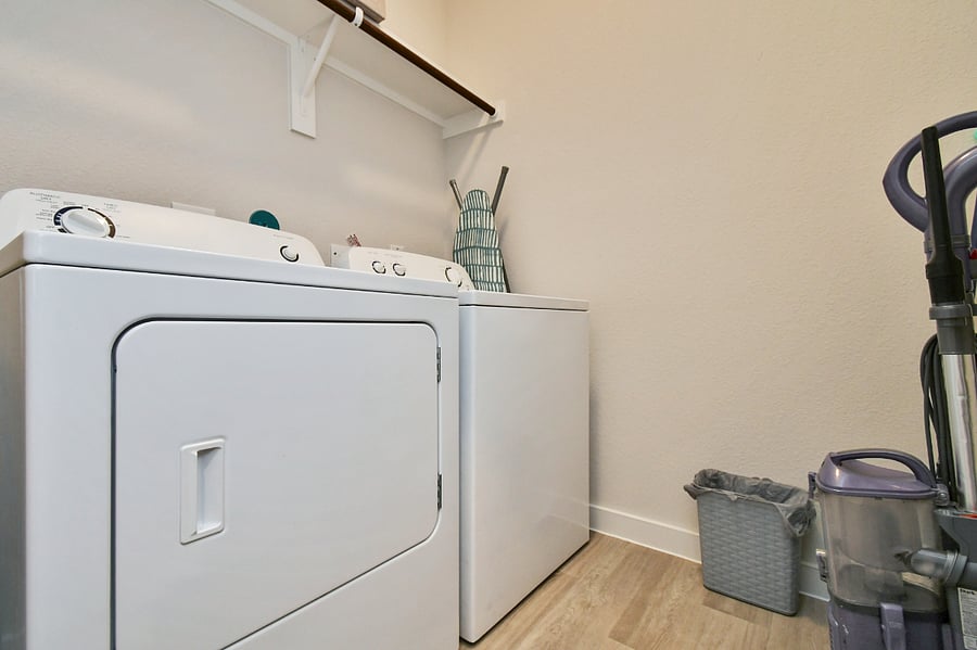 Get the laundry done with full size washer and dryer!