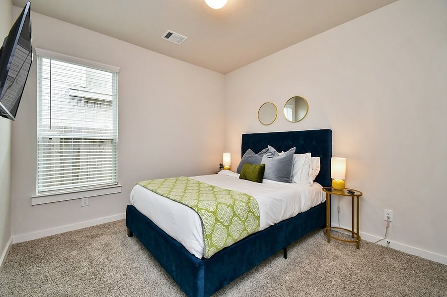 Enjoy the cozy queen bedroom with comfortable mattress.