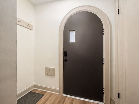 Little mud room and entry closet containing vaccums