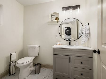 First Floor Bathroom Located off the Kitchen