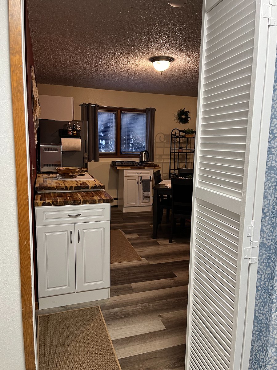 View into living space from sink and laundry area