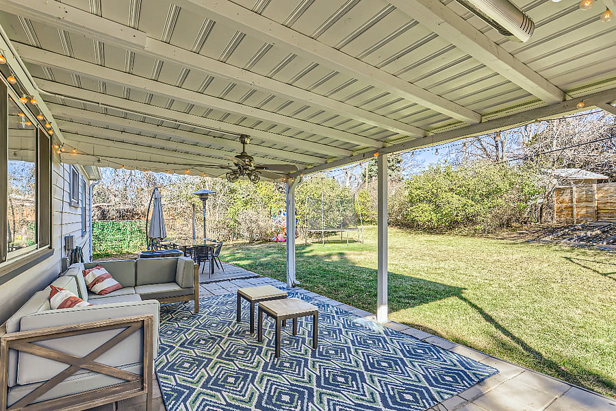 Backyard covered patio with couch