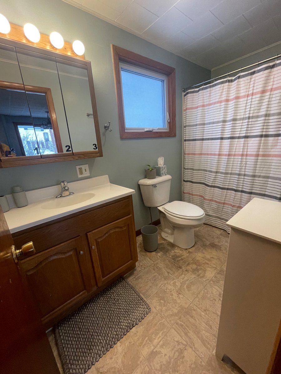 Shared bathroom with shower and tub