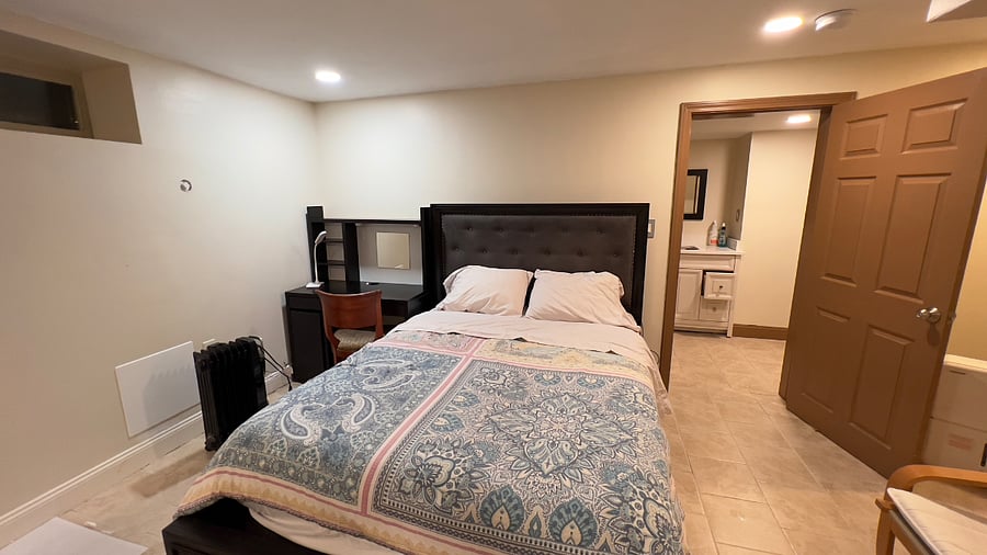 Lower level furnished bedroom, Queen bed and semi-private bathroom (shared with 1 other room)