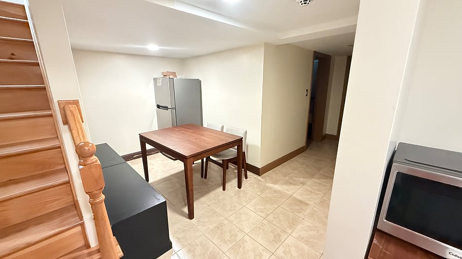 Lower level shared common area, dining/seating, kitchenette,