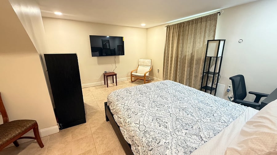 Lower level furnished bedroom, Queen bed and semi-private bathroom (shared with 1 other room)