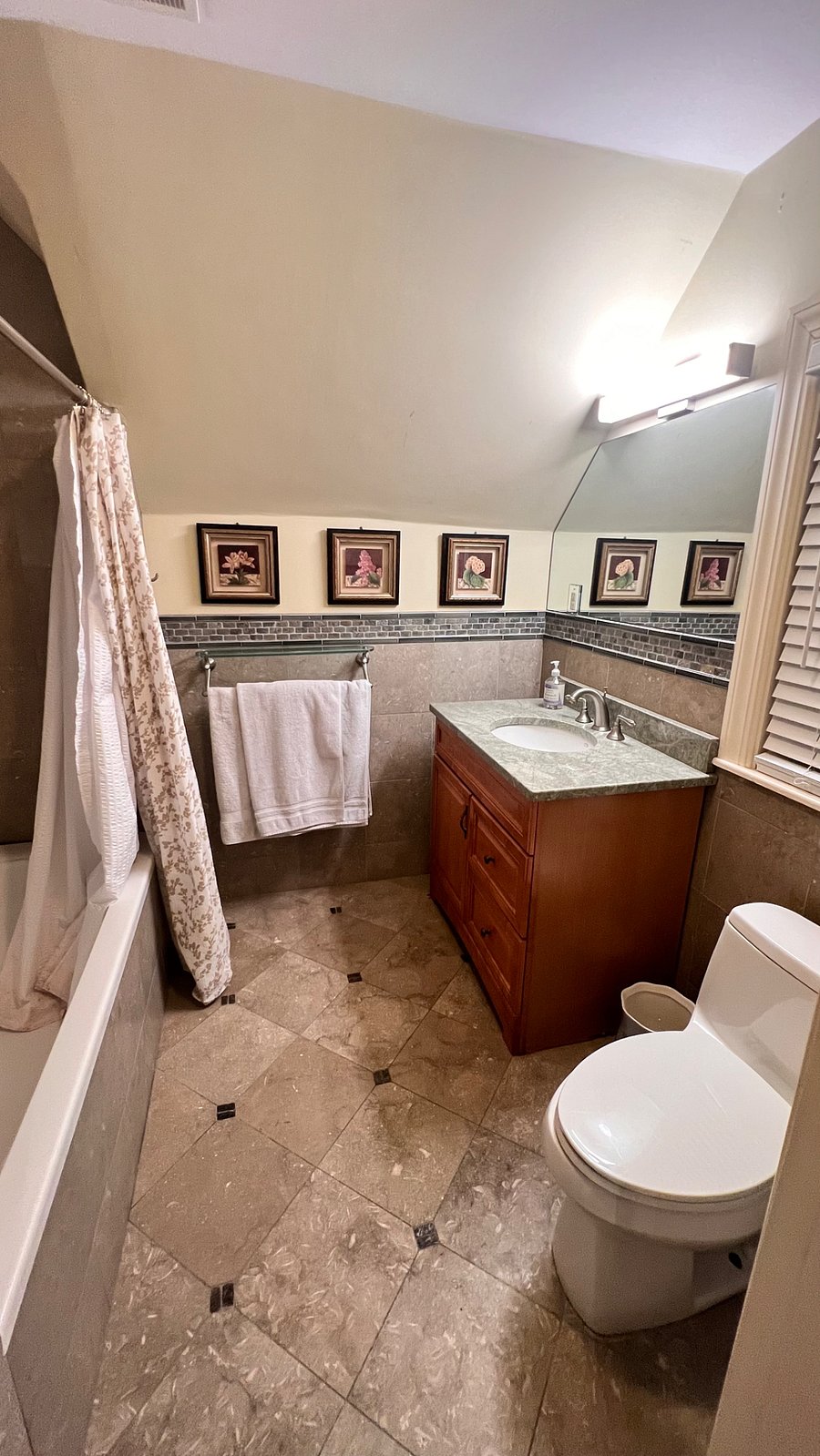 Upper level bedroom with en-suite private bathroom.