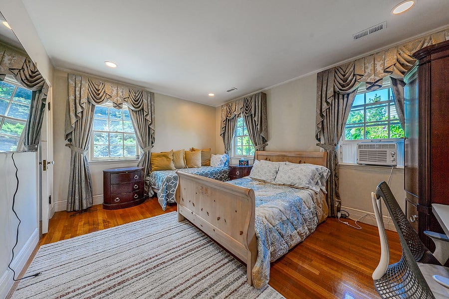 Upper level bedroom with en-suite private bathroom.