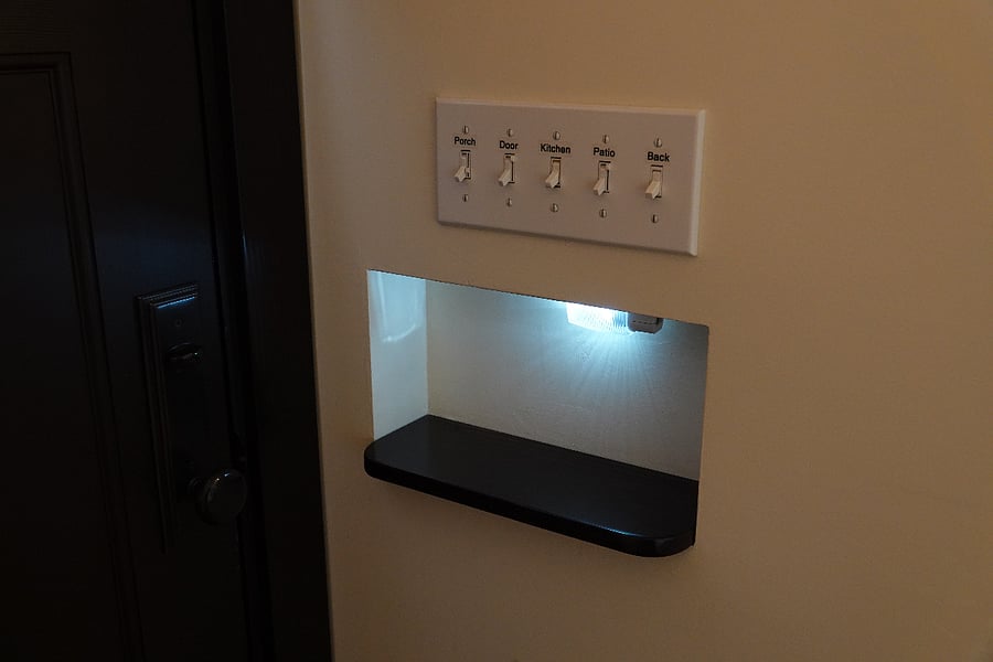 Key shelf by front door, with power.