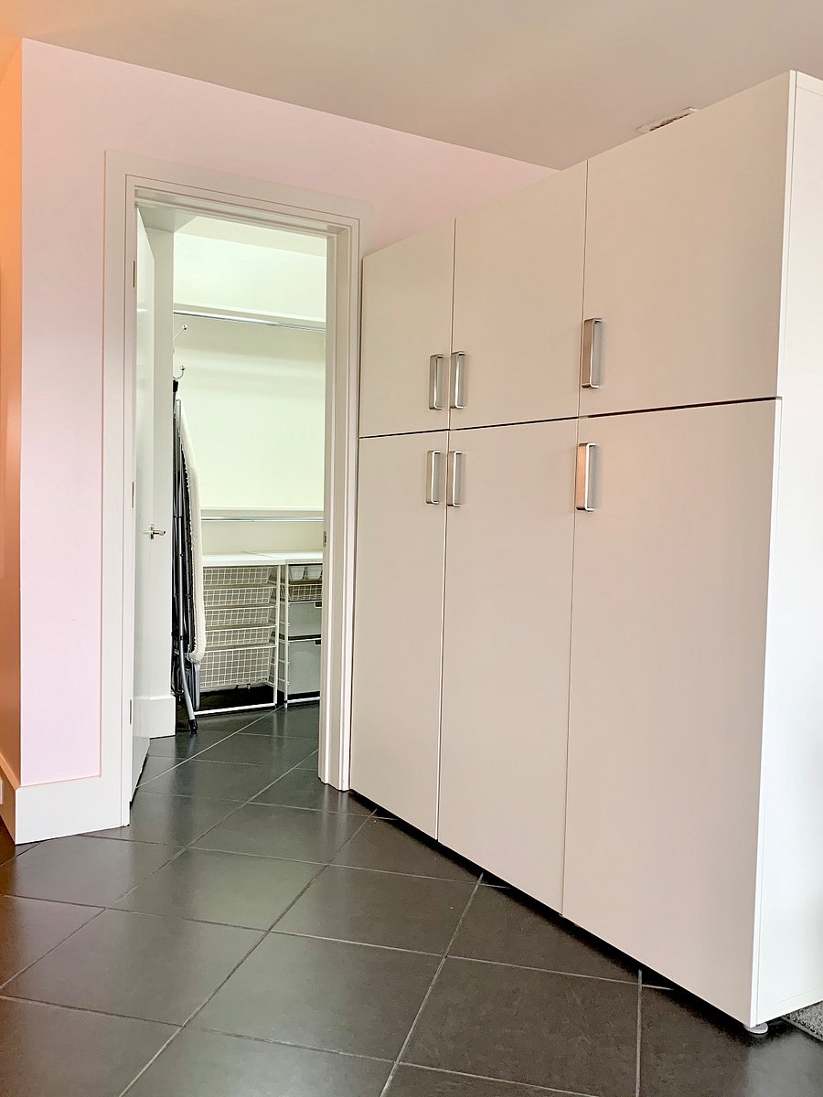 Large walk in closet with Alpha storage for that person who likes organization.