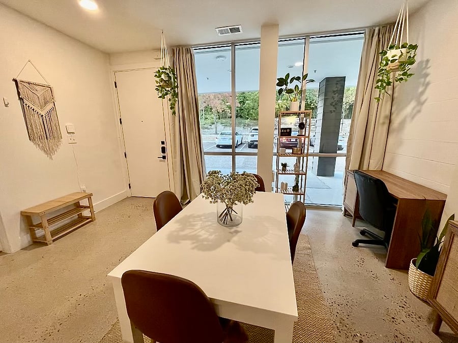 Walk in area. Includes a 2nd work from home setup with a large desk and desk chair.
