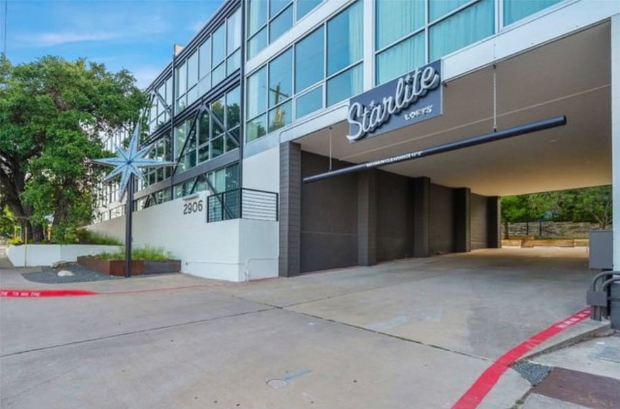Front of condominium building with cute retro style vibes. Bus stop located just a few steps away from the front of the building that can take you downtown in minutes or can drive there less than 2 miles away!