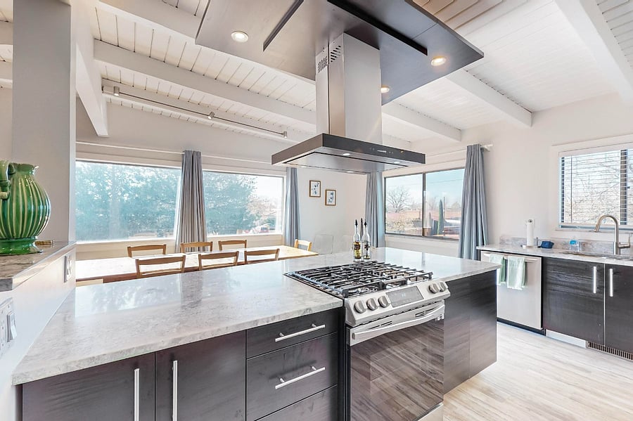 spacious kitchen with lots of counter space and plenty of storage. High-end range/oven, refrigerator, dishwasher, microwave.