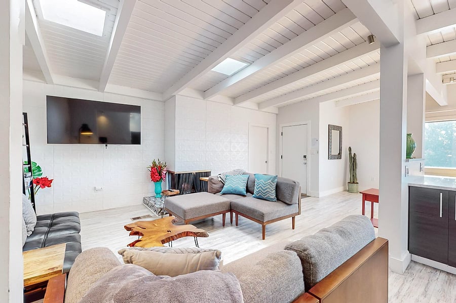 spacious living room with smart tv