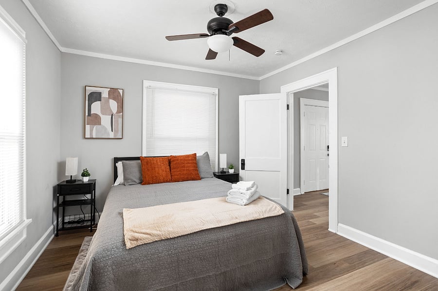 Enjoy a comfortable, cozy bed complemented by stylish aesthetic wall decor, creating a perfect blend of relaxation and charm.