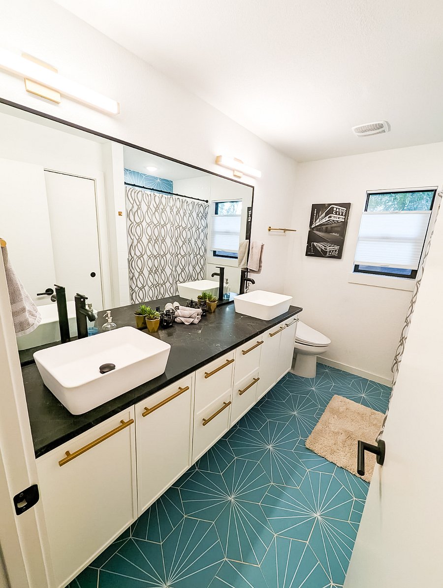 Bright and spacious bathroom with 2 vanities, plenty of countertop space, and spacious bath tub!