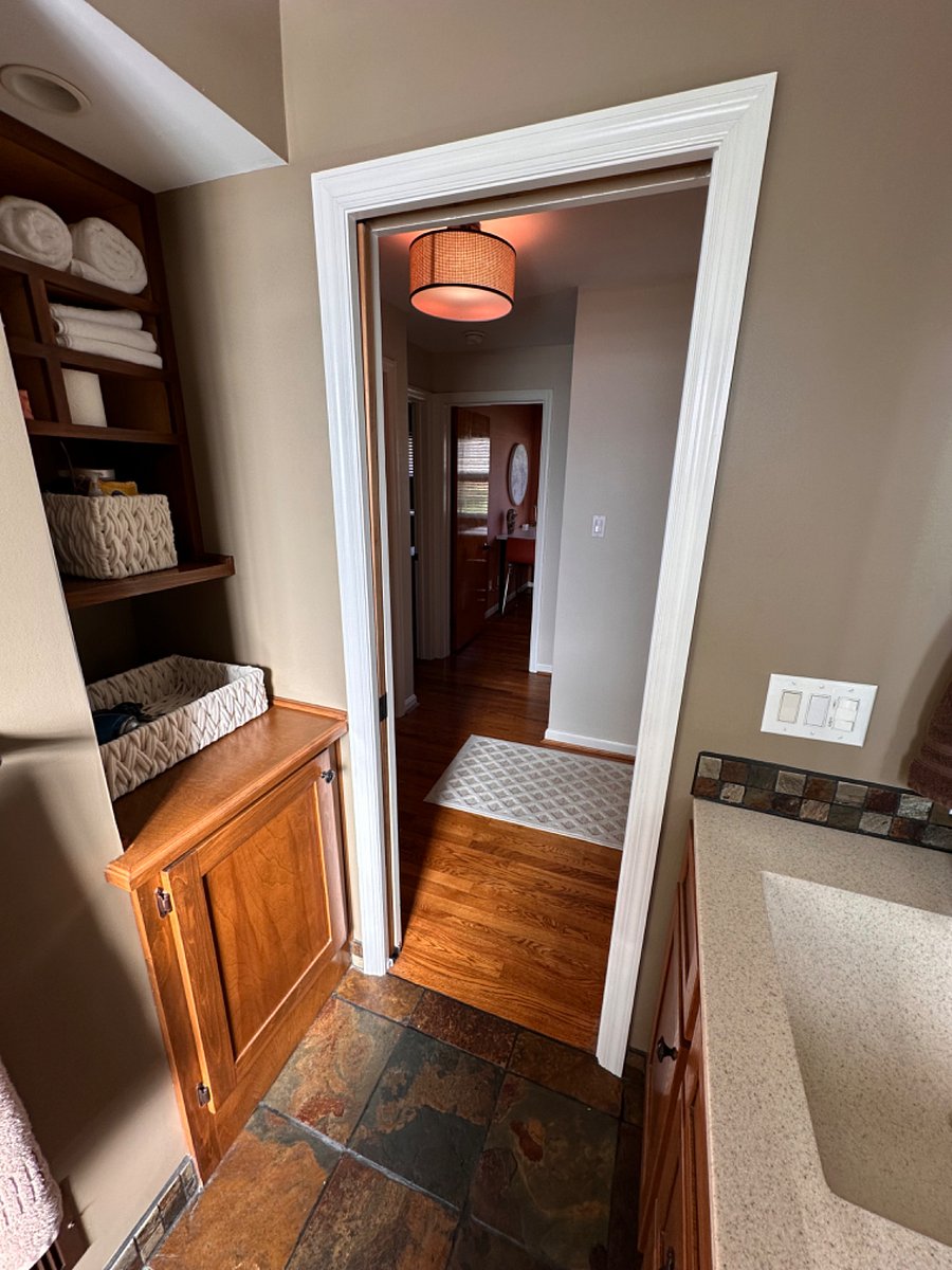 Hall bathroom, looking into hallway and laundry/office