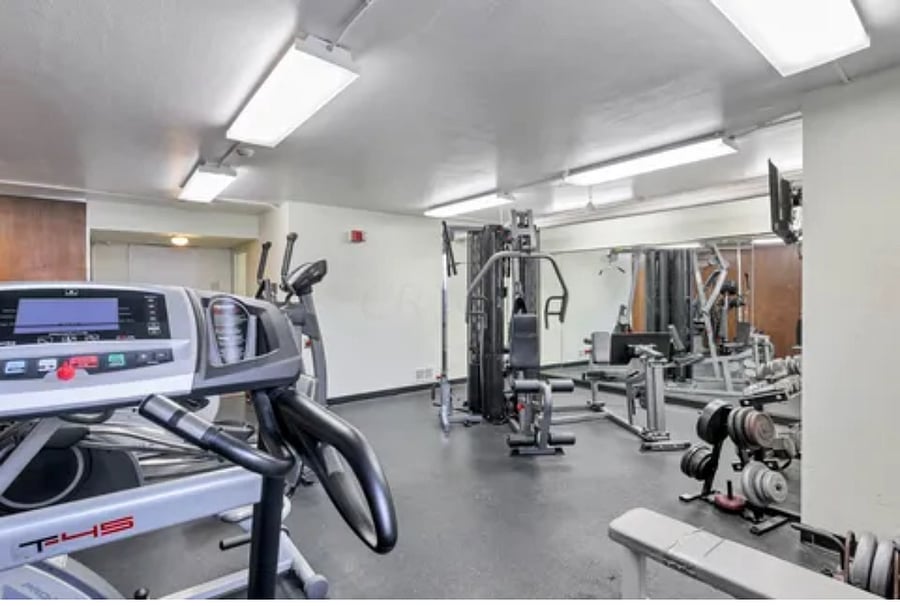 On-site gym with weights, bike vibration plate and treadmill