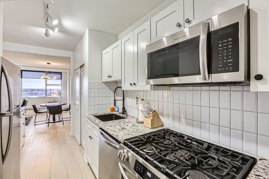 Full size gas stove, refrigerator, microwave and dishwasher